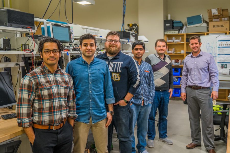 Graduate students in the power systems lab are working on a DC breaker.