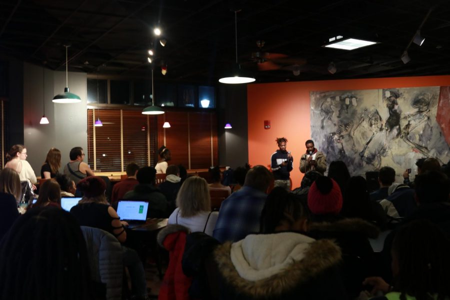 Two members of the Black Student Council express themselves by performing poems in the AMU Brew Cafe.