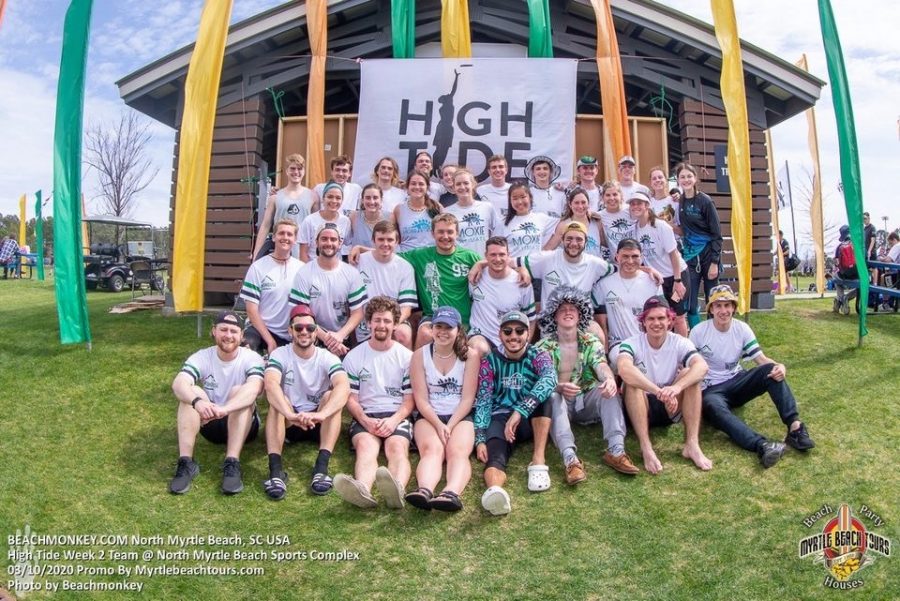 Bryan Geenen (middle with green shirt) takes a photo  March 10 as a member of the men’s and women’s club ultimate frisbee teams. The teams were at a tournament called “High Tide" when they found out classes were moved online. Photo courtesy of Bryan Geenen.