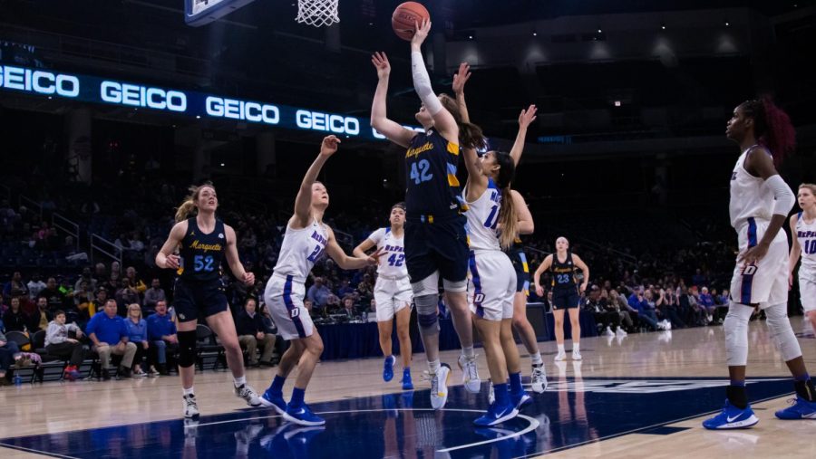 Lauren Van Kleunen (42) attempts a shot in Marquette women's basketball loss to DePaul March 9. 