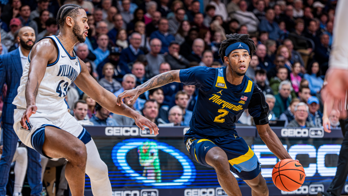 Villanova's Eric Dixon (left) leads all of NCAA DI in scoring, averaging 22.9 points per game.